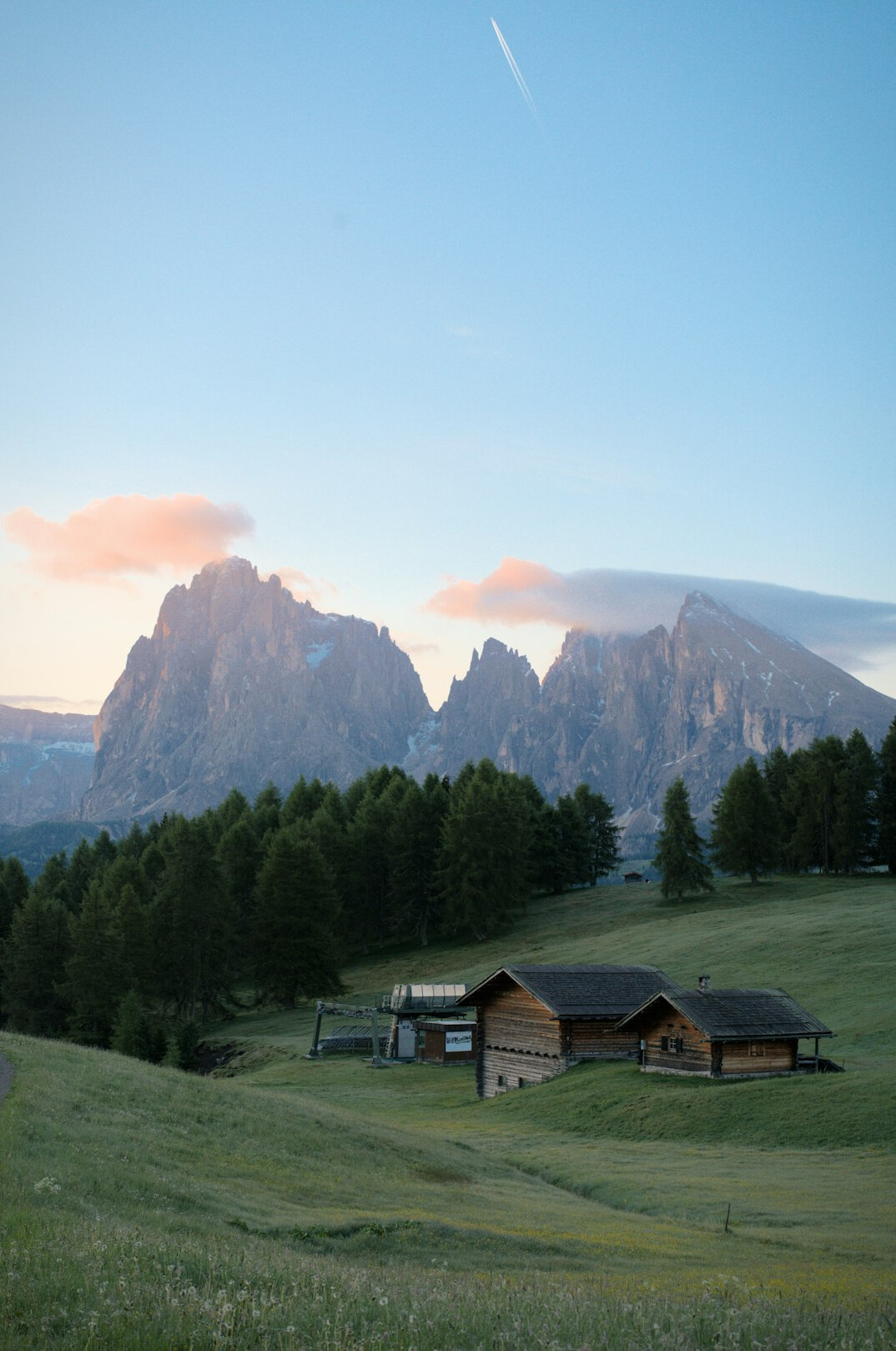 Misty green hills at sunrise