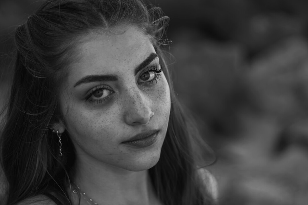 Portrait of a young woman with a gentle smile